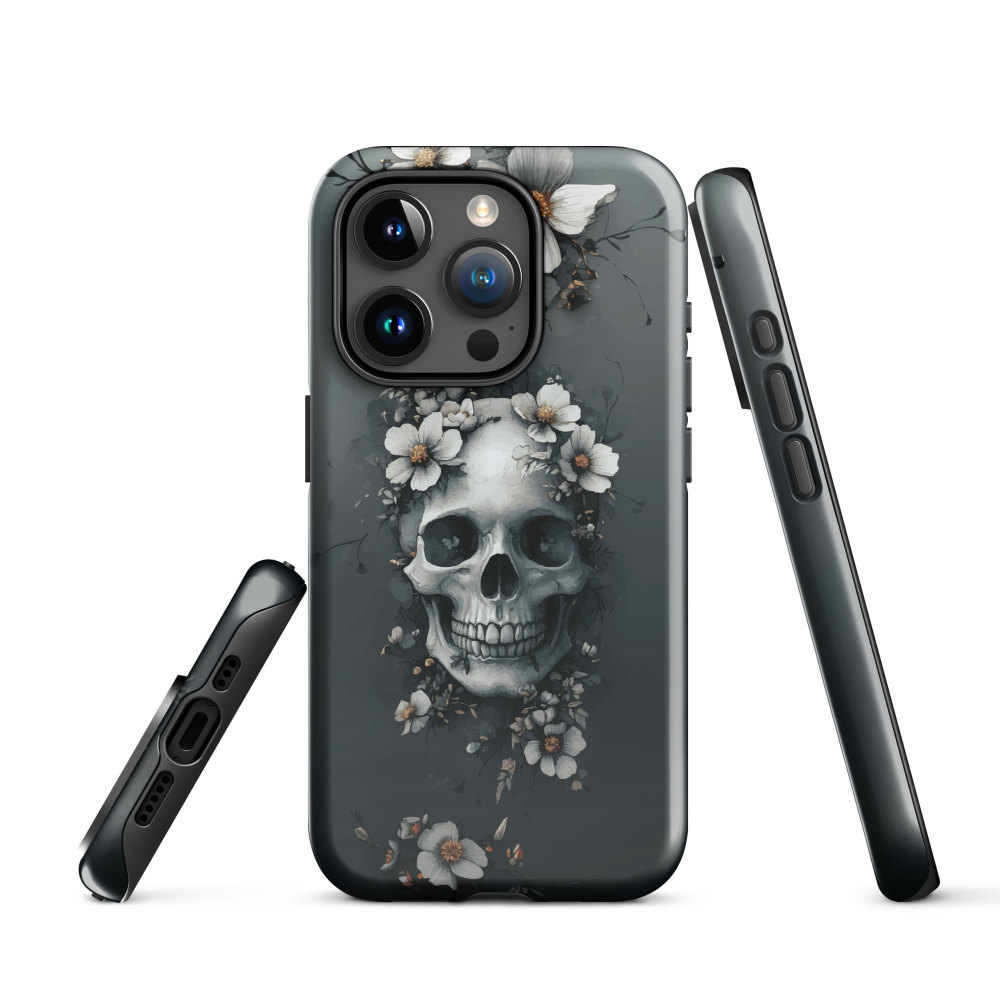 Gothic phone case with a floral skull design in grey tones, featuring white blossoms and dark detailing.