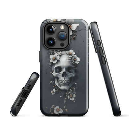 Gothic phone case with a floral skull design in grey tones, featuring white blossoms and dark detailing.