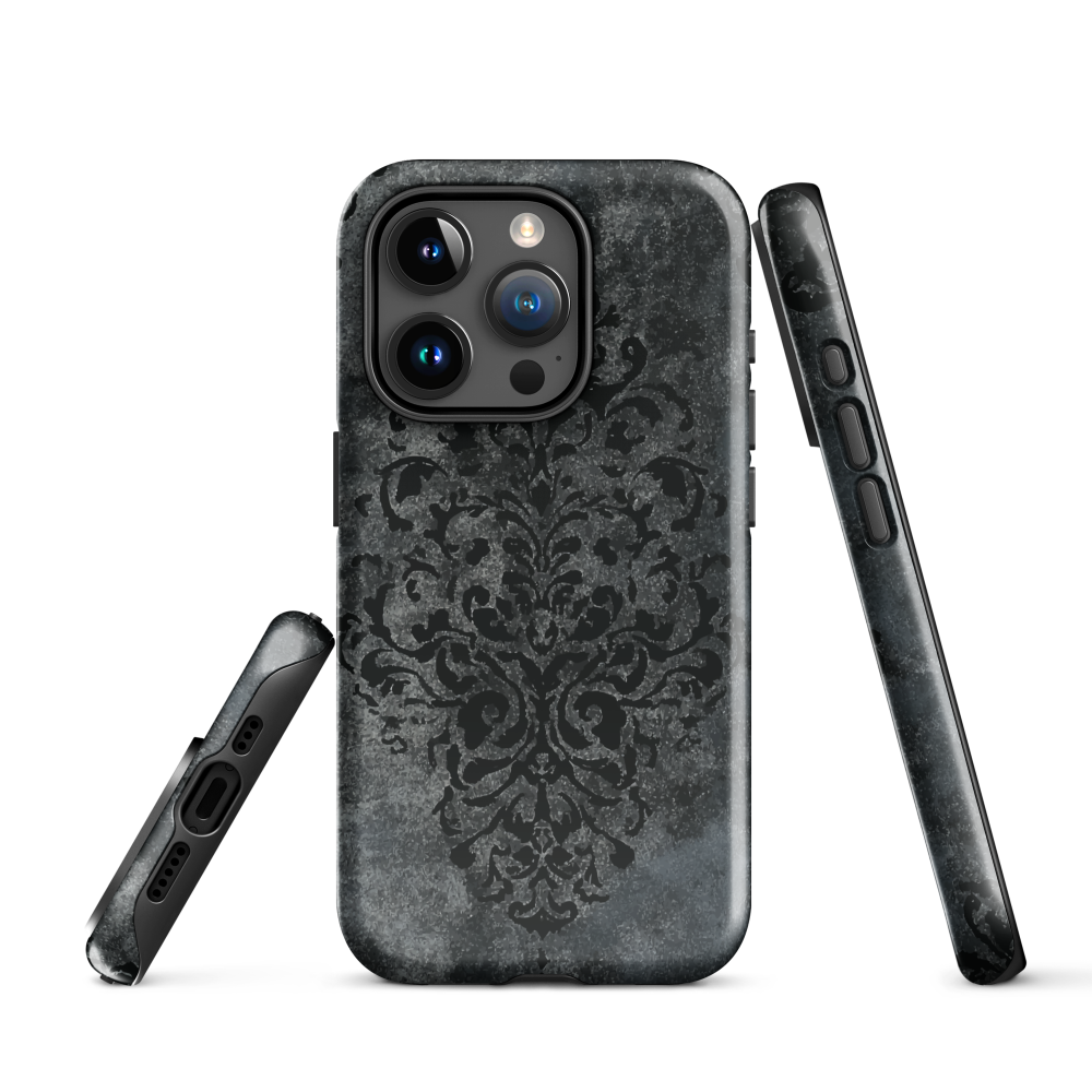 Dark damask patterned phone case with a vintage gothic aesthetic and textured stone background.