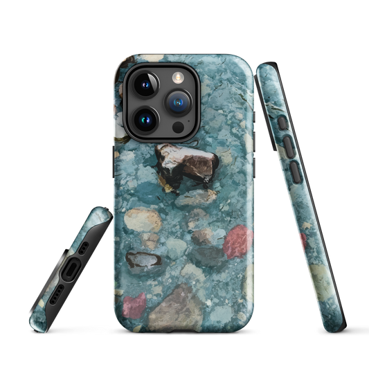 Washed Away designer phone case with abstract river stone artwork in earthy blues and natural tones.
