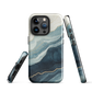 An elegant abstract phone case inspired by layered coastal forms in blue and teal tones.