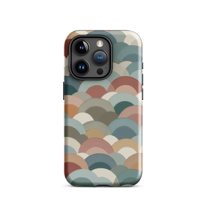 A soft retro-inspired phone case featuring layered arc shapes in warm, earthy tones.