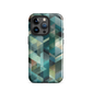 Modern abstract geometric phone case in teal and blue tones with layered retro-inspired shapes.