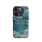 Nature-inspired phone case featuring a dragonfly over calm water with blue and green forest tones.