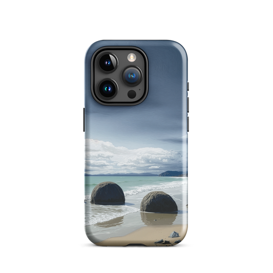 Moeraki Boulders coastal designer phone case with ocean waves and dramatic NZ sky