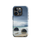Moeraki Boulders coastal designer phone case with ocean waves and dramatic NZ sky