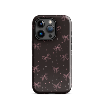 Midnight Bow seamless repeat pattern — pink hand-drawn ribbon bows and sparkle stars on a black background