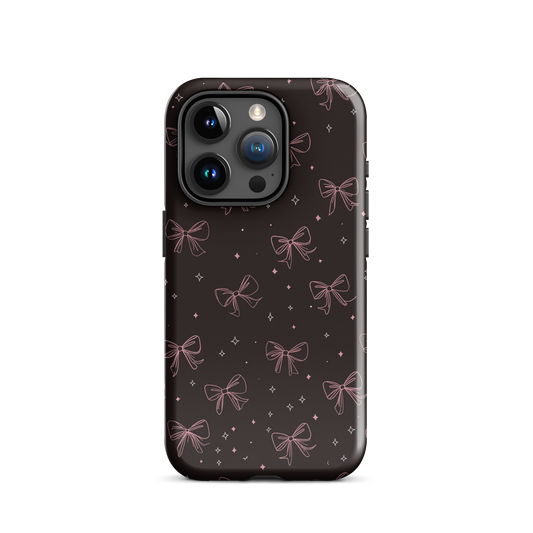 Midnight Bow seamless repeat pattern — pink hand-drawn ribbon bows and sparkle stars on a black background