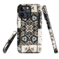 Moroccan tile pattern phone case in black, white, and gold tones with vintage-inspired design.