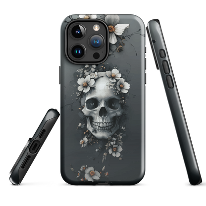 Gothic phone case with a floral skull design in grey tones, featuring white blossoms and dark detailing.
