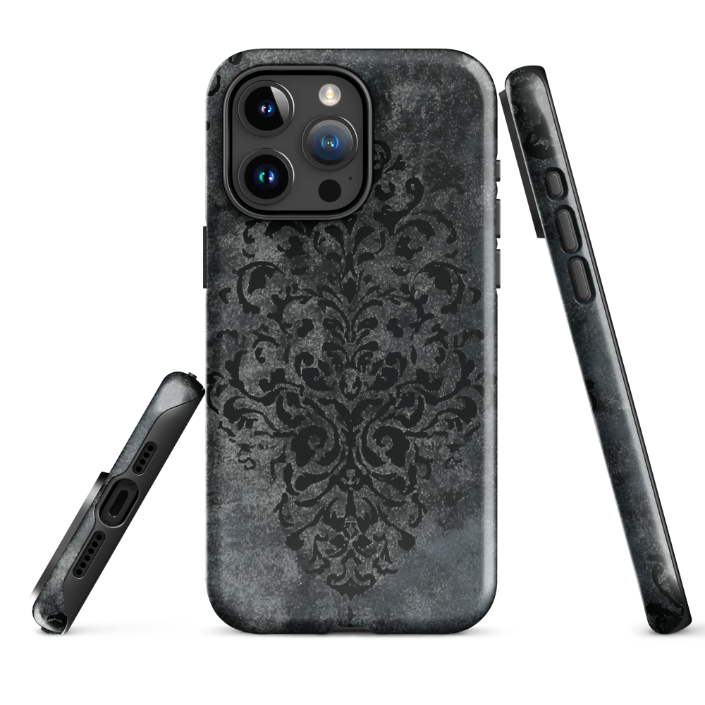 Dark damask patterned phone case with a vintage gothic aesthetic and textured stone background.