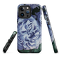 Designer phone case with a bold blue rose artwork and glossy finish.