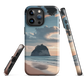 Phone case with Cathedral Cove beach and sunset scene, featuring soft skies and sea stack