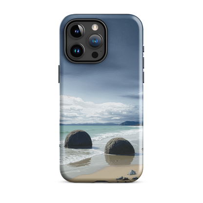 Moeraki Boulders coastal designer phone case with ocean waves and dramatic NZ sky