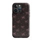 Midnight Bow seamless repeat pattern — pink hand-drawn ribbon bows and sparkle stars on a black background
