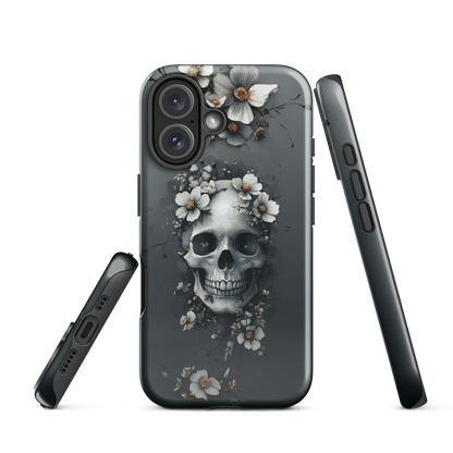 Gothic phone case with a floral skull design in grey tones, featuring white blossoms and dark detailing.