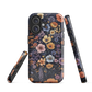 Phone case with colourful wildflowers on dark background, floral art design
