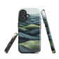 Phone case with layered mountain and forest landscape in blue and green hues