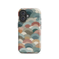 A soft retro-inspired phone case featuring layered arc shapes in warm, earthy tones.