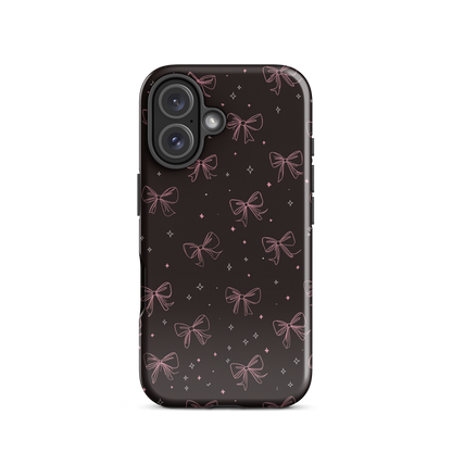 Midnight Bow seamless repeat pattern — pink hand-drawn ribbon bows and sparkle stars on a black background