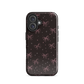 Midnight Bow seamless repeat pattern — pink hand-drawn ribbon bows and sparkle stars on a black background