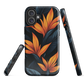 Phone case with bold orange bird of paradise flowers on dark background.