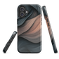 Phone case with flowing abstract design in black, copper and charcoal tones, inspired by dusk shadows