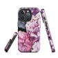 Designer phone case with pink and purple hydrangea floral artwork.