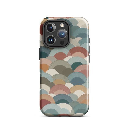 A soft retro-inspired phone case featuring layered arc shapes in warm, earthy tones.