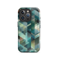 Modern abstract geometric phone case in teal and blue tones with layered retro-inspired shapes.