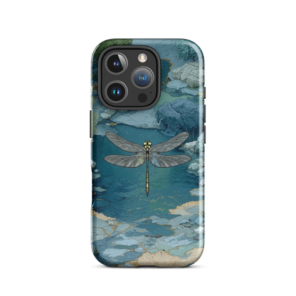 Nature-inspired phone case featuring a dragonfly over calm water with blue and green forest tones.