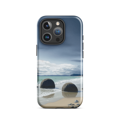 Moeraki Boulders coastal designer phone case with ocean waves and dramatic NZ sky
