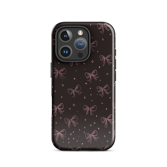 Midnight Bow seamless repeat pattern — pink hand-drawn ribbon bows and sparkle stars on a black background