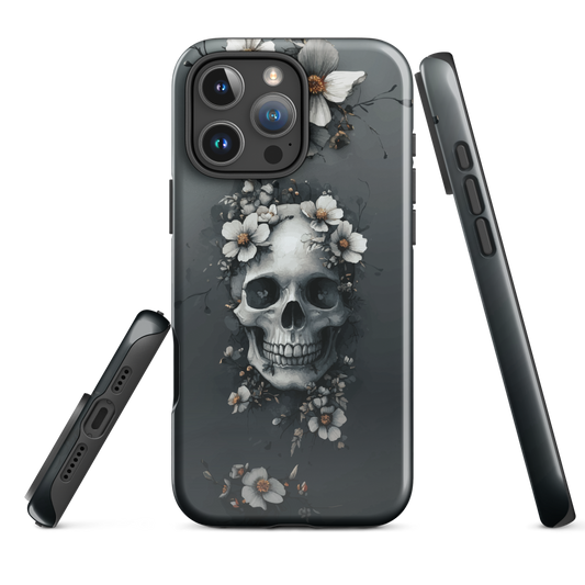 Gothic phone case with a floral skull design in grey tones, featuring white blossoms and dark detailing.