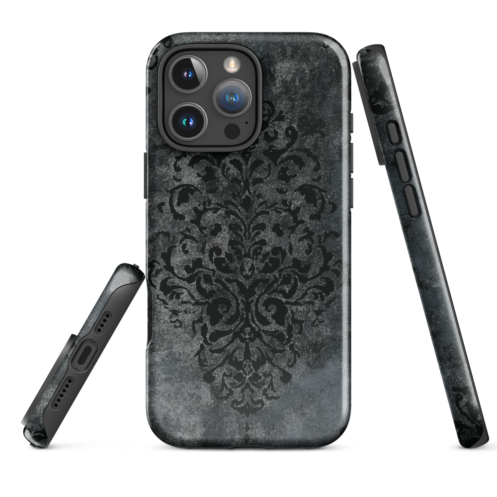 Dark damask patterned phone case with a vintage gothic aesthetic and textured stone background.