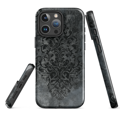 Dark damask patterned phone case with a vintage gothic aesthetic and textured stone background.