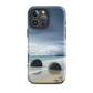 Moeraki Boulders coastal designer phone case with ocean waves and dramatic NZ sky