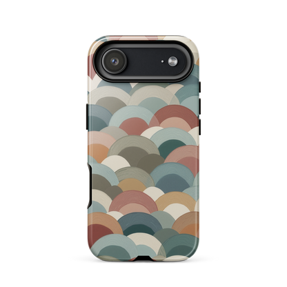 A soft retro-inspired phone case featuring layered arc shapes in warm, earthy tones.