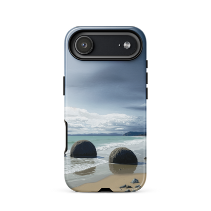 Moeraki Boulders coastal designer phone case with ocean waves and dramatic NZ sky