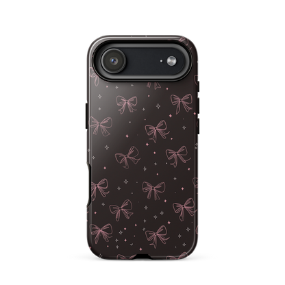Midnight Bow seamless repeat pattern — pink hand-drawn ribbon bows and sparkle stars on a black background
