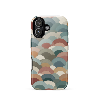 A soft retro-inspired phone case featuring layered arc shapes in warm, earthy tones.