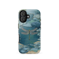 Nature-inspired phone case featuring a dragonfly over calm water with blue and green forest tones.