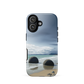 Moeraki Boulders coastal designer phone case with ocean waves and dramatic NZ sky