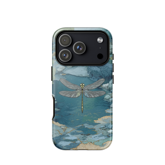 Nature-inspired phone case featuring a dragonfly over calm water with blue and green forest tones.