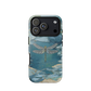 Nature-inspired phone case featuring a dragonfly over calm water with blue and green forest tones.