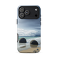 Moeraki Boulders coastal designer phone case with ocean waves and dramatic NZ sky