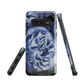 Designer phone case with a bold blue rose artwork and glossy finish.