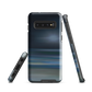 Dark abstract phone case with blue and grey streaks and glossy finish.