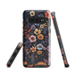 Phone case with colourful wildflowers on dark background, floral art design