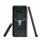Longhorn skull set against a dark, textured backdrop - protective phone case.